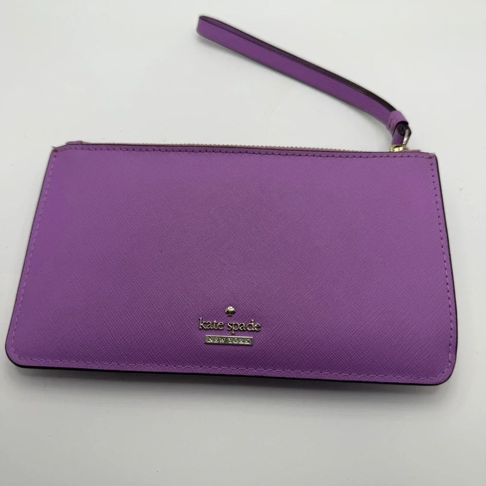 Kate Spade New York purple leather wristlet.